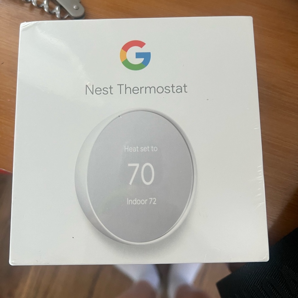 nest thermostat - brand new in casing